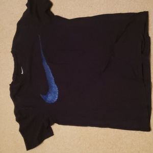 Small Nike tee probably fits like a kids size 14/16